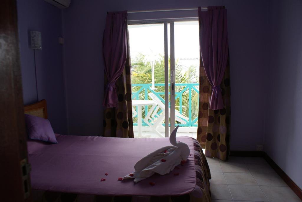 Coral Azur Cosi Holidays Hotel Grand Baie Room photo